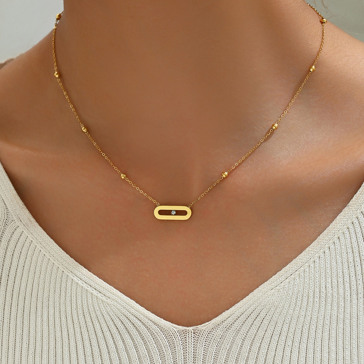 Geometric Gold Bar Pendant with Beaded Necklace